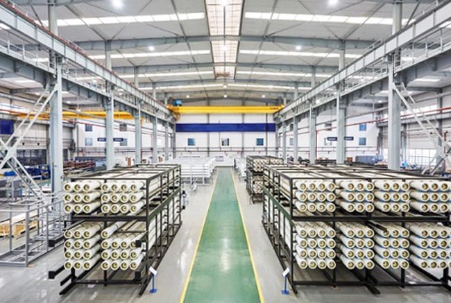 Inside the facility at Transfilm, stacks of high performance desalination membranes.