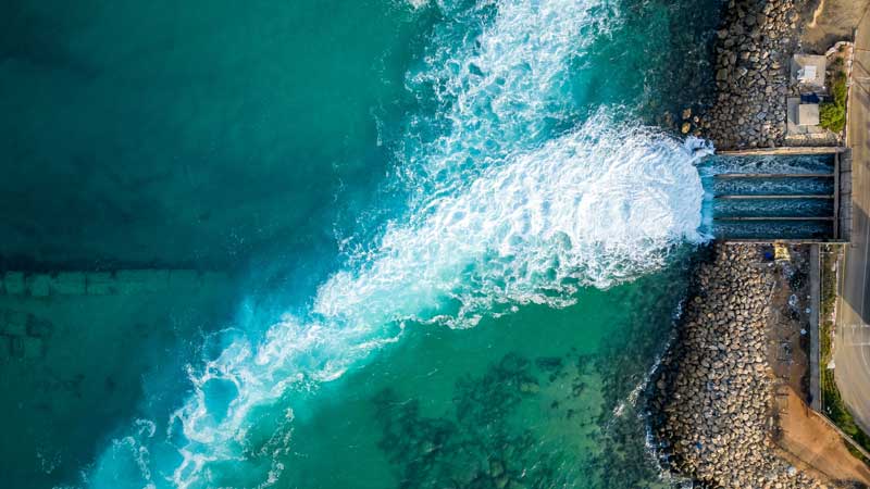Water flowing back to ocean at a seawater desalination facility.